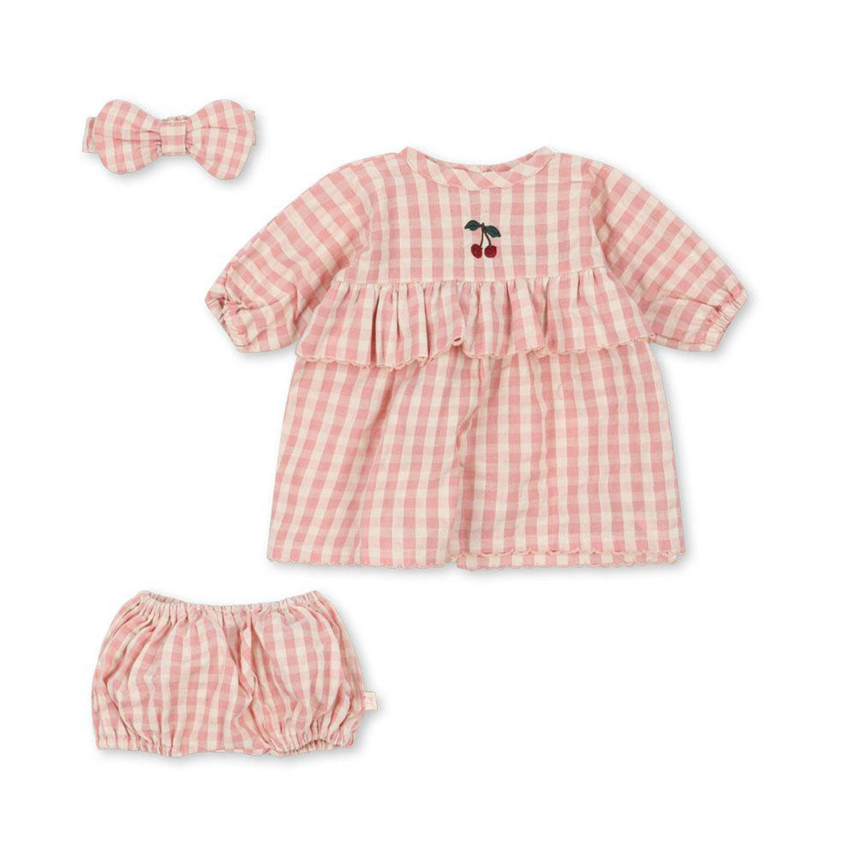 De pop van je kindje is natuurlijk niet compleet zonder een leuke poppenoutfit. Deze poppenkleertjes set in de variant powder pink check van Konges Slojd maakt de speelervaring van je kleintje, wanneer hij of zij met een pop speelt, helemaal compleet! VanZus