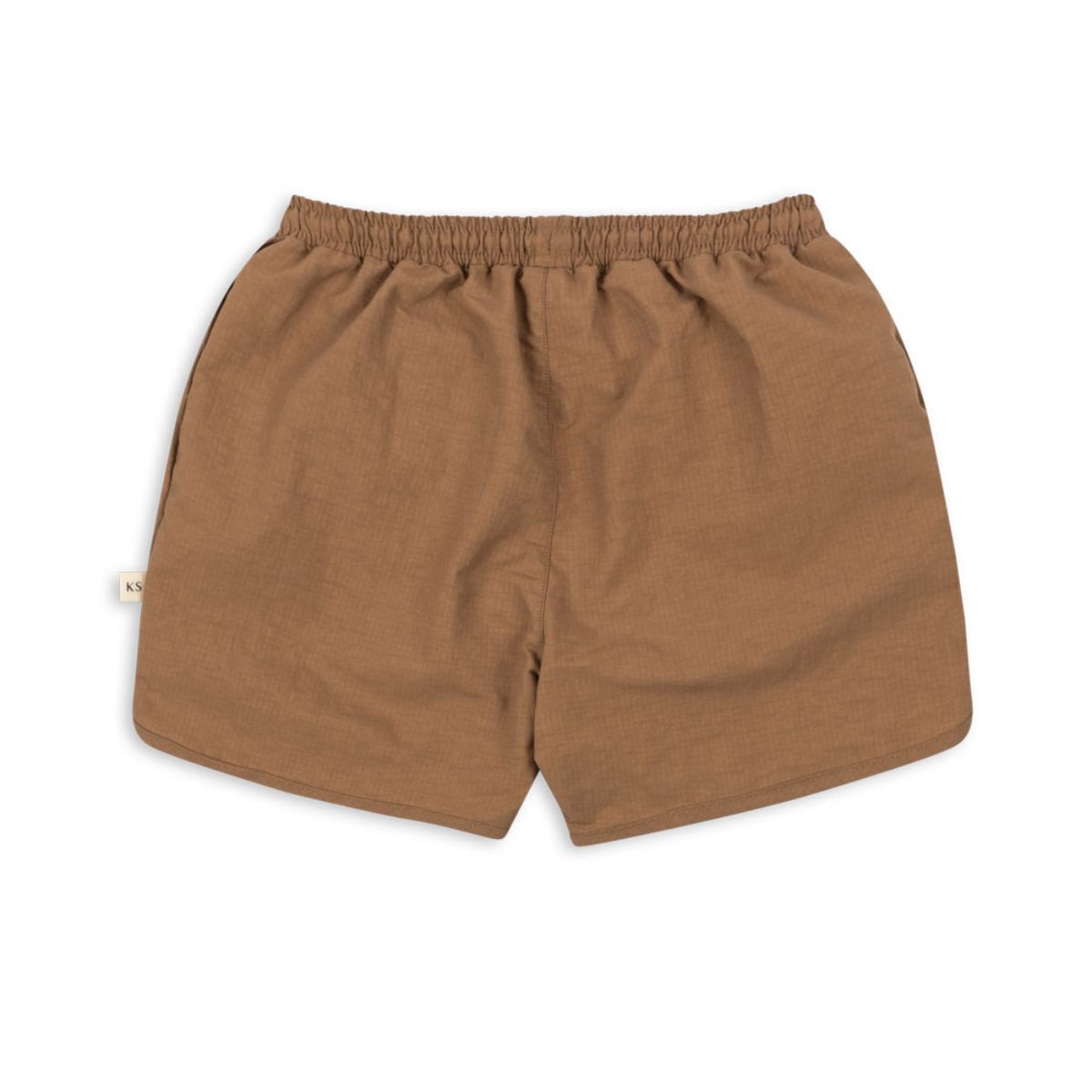 De Konges Slojd roby asnou zwembroek tigers eye is de perfecte keuze voor een zomerse dag vol waterplezier. Deze bruine zwemshort is gemaakt van een zachte en soepele stof, waardoor je kleintje vrij kan bewegen. VanZus