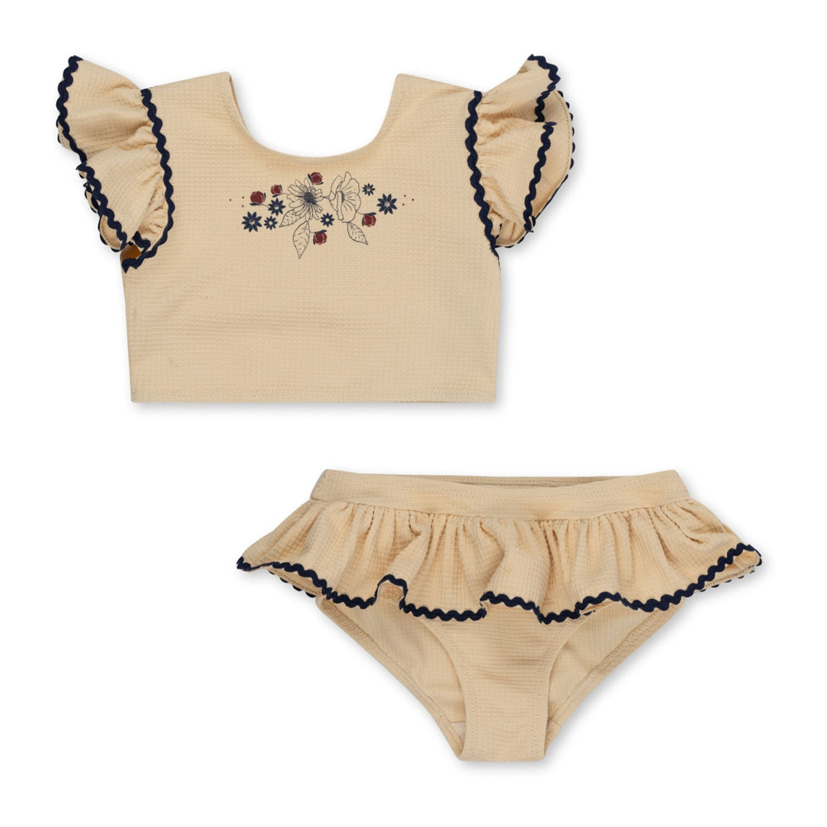 Kleed je kindje in deze te schattige shi bikini in crème van Konges Slojd deze zomer. Dit is een superlieve bikini met schattige vlindermouwen en een mooie beige kleur. Perfect voor de warme dagen! VanZus