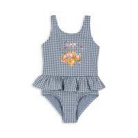 Het Konges Slojd soline badpak in de variant vintage indigo is de ideale keuze voor jouw kleine zwemmer deze zomer! Met een UPF 50+ bescherming biedt het badpak uitstekende bescherming tegen schadelijke UV-stralen. VanZus