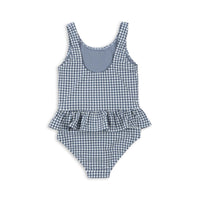Het Konges Slojd soline badpak in de variant vintage indigo is de ideale keuze voor jouw kleine zwemmer deze zomer! Met een UPF 50+ bescherming biedt het badpak uitstekende bescherming tegen schadelijke UV-stralen. VanZus