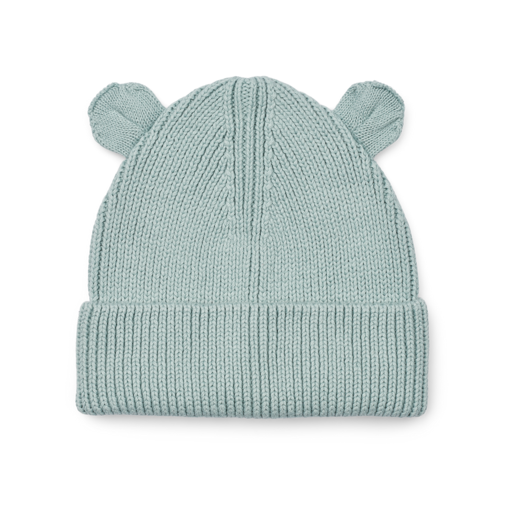 Maak kennis met te leuke gina beanie met oortjes in de kleur icy blue van het toffe merk Liewood. Deze muts is de perfecte combinatie van stijl en functionaliteit voor de kleintjes! VanZus