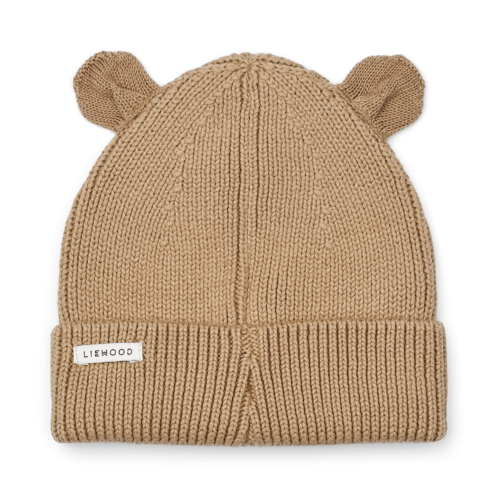 Maak kennis met te leuke gina beanie met oortjes in de kleur oat van het toffe merk Liewood. Deze muts is de perfecte combinatie van stijl en functionaliteit voor de kleintjes! VanZus