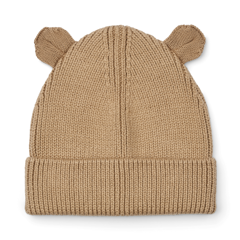 Maak kennis met te leuke gina beanie met oortjes in de kleur oat van het toffe merk Liewood. Deze muts is de perfecte combinatie van stijl en functionaliteit voor de kleintjes! VanZus