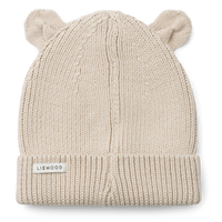 Maak kennis met te leuke gina beanie met oortjes in de kleur sandy van het toffe merk Liewood. Deze muts is de perfecte combinatie van stijl en functionaliteit voor de kleintjes! VanZus