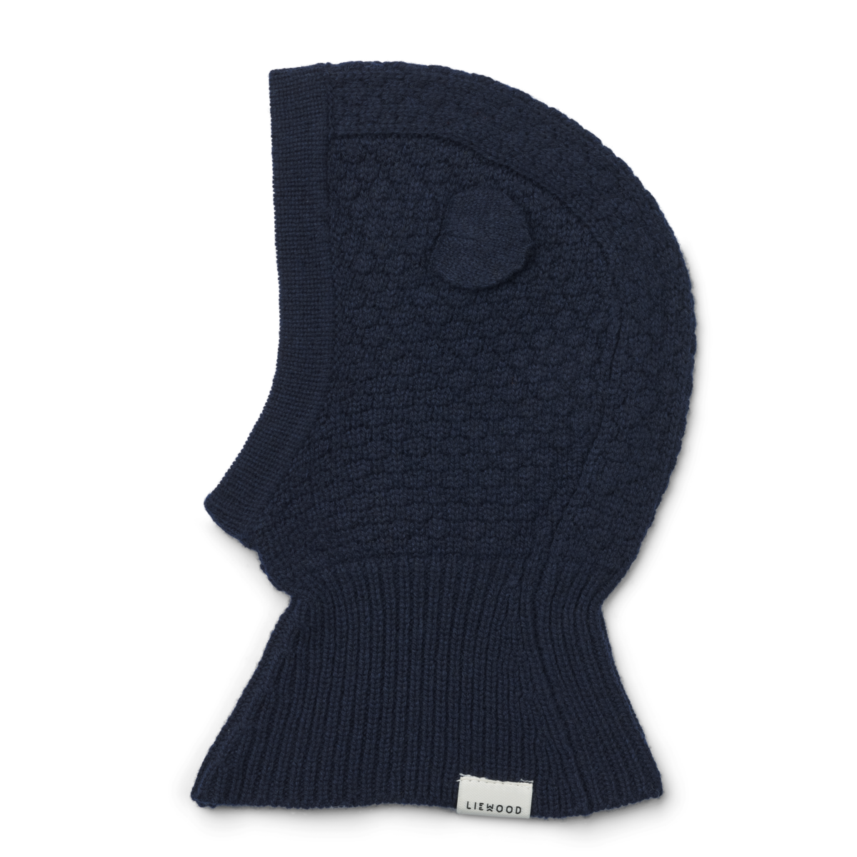 Houd het hoofdje van je kindje lekker warm tijdens de koude wintermaanden met deze oggy balaclava muts in de kleur classic navy van het merk Liewood. Deze zachte en warme muts gaat helemaal om het hoofd van je kleintje heen, waardoor zowel de nek, als het hoofd en de oren lekker warm blijven! VanZus