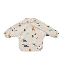 Eten en knoeien doet je kleintje in stijl met de slab merle van Liewood uit de collectie polar/sandy. Het slabbetje met lange mouwen is perfect voor kinderen die leren te eten. Het gerecycelde materiaal zorgt ervoor dat je het slabbetje gelijk kan afspoelen en schoonvegen na het eten. VanZus