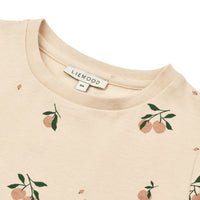 Verrijk de garderobe van je baby met dit schattige apia baby T-shirt in de kleur peach/sea shell van het merk Liewood. Dit stijlvolle shirtje ziet er niet alleen geweldig uit, maar zit ook heel erg comfortabel! VanZus