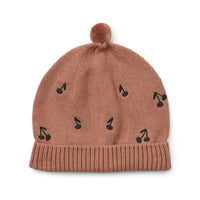 Houd het hoofd en de oren van je kindje lekker warm met deze te gekke aster beanie in de kleur cherries/dark rosetta van het merk Liewood. Deze heerlijk warme muts is niet alleen handig voor de koude wintermaanden, maar ziet er ook geweldig uit! VanZus