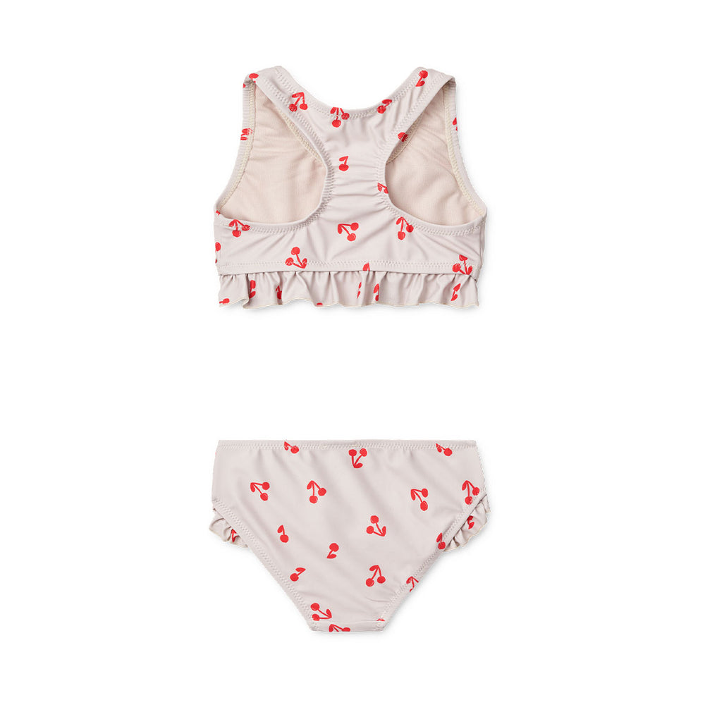 Jouw kind is helemaal summer ready met deze bellamy bikini set in de vrolijke cherries/sandy print van het merk Liewood! Deze schattige bikini is perfect voor kleine zwemmers en biedt zowel stijl als comfort. VanZus