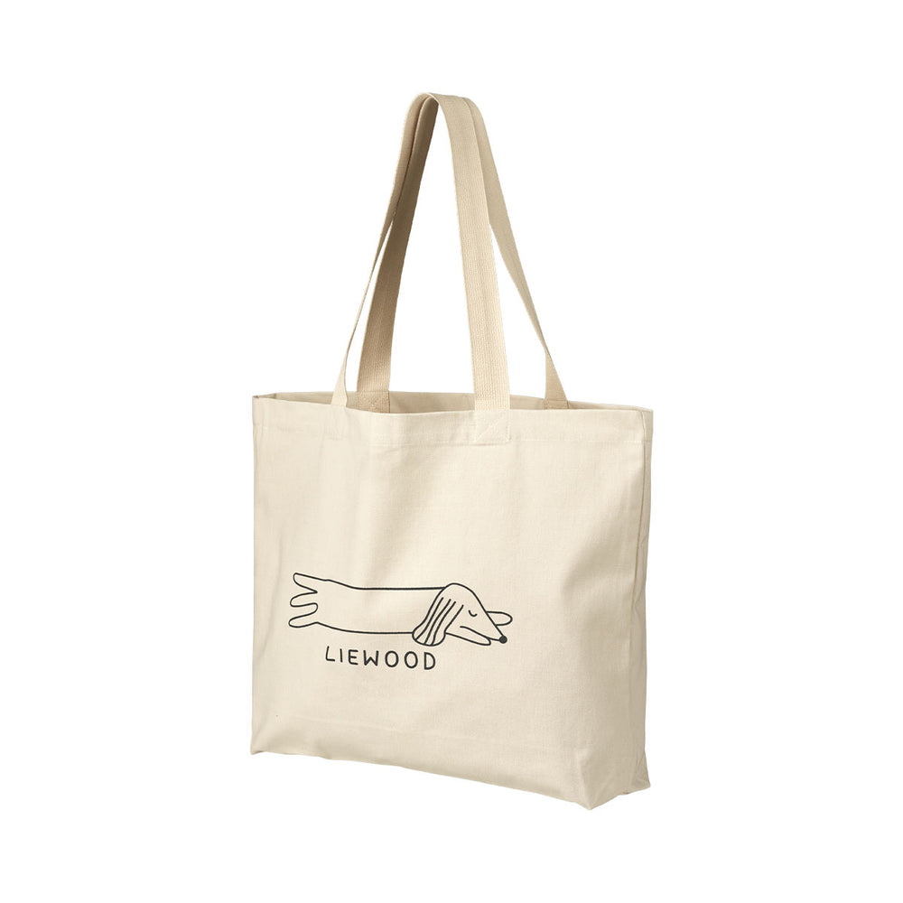 Met de Liewood grote schoudertas in dog sandy ben je altijd goed voorbereid. Of je nu onderweg bent, een ontspannend weekendje weg, of gewoon een stukje wandelt, deze tas biedt de perfecte oplossing om al je essentials bij de hand te hebben. VanZus