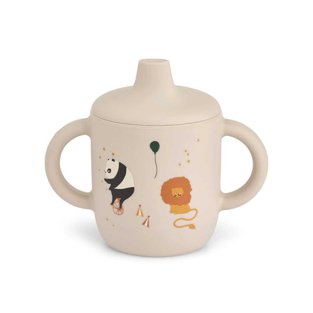 Zelf leren drinken doe je met deze neil sippy cup in de variant circus/sandy van het merk Liewood. Deze mooie tuitbeker is ideaal voor je kindje om zelf te leren drinken, ligt lekker in de hand en ziet er ook nog eens leuk uit! VanZus