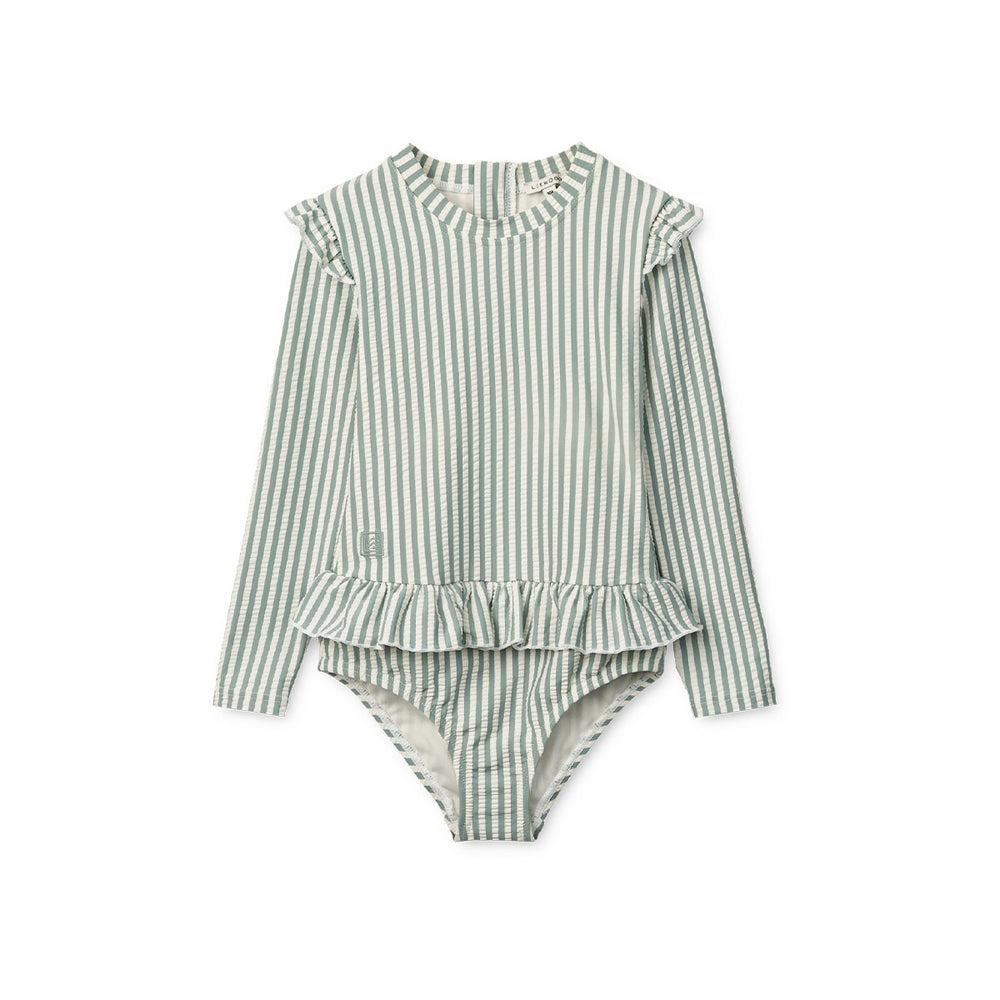 Op zoek naar een hip badpak voor jouw kindje? Met het Liewood baby sille seersucker badpak in de variant stripe pale tuscany/creme de la creme steelt jouw kindje echt de show bij het zwembad, in de tuin, aan de zee of op vakantie. VanZus