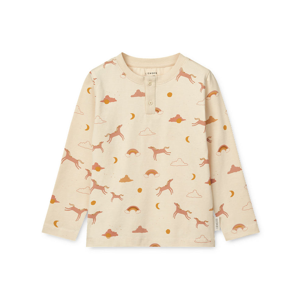 Kijk hoe leuk deze Liewood Wilhelm pyjama dream/ecru is! Deze leuke kinderpyjama is beige en heeft een print van regenbogen en paardjes. VanZus