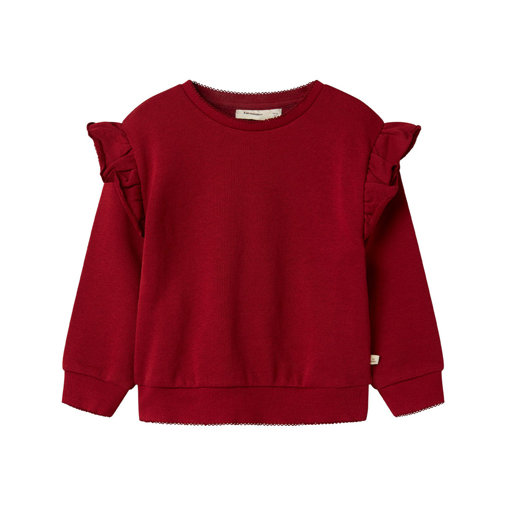 De Lil' Atelier kilano sweat trui in de kleur red dahlia is een zachte en comfortabele trui, perfect voor je kleintje. De trui is gemaakt van 100% biologisch katoen, wat de trui heerlijk zacht, warm, maar ook luchtig maakt. VanZus
