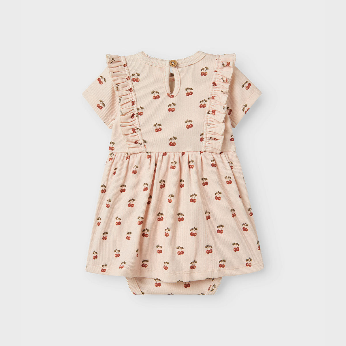 De Lil' Atelier lavo ena romperjurk in silver peony is een prachtige jurk die de garderobe van je kind een stijlvolle upgrade geeft. Deze jurk, gemaakt van 57% biologisch katoen, 38% TENCEL™ Lyocell en 5% elastaan, heeft een regular fit, korte mouwen en een comfortabele O-hals. VanZus