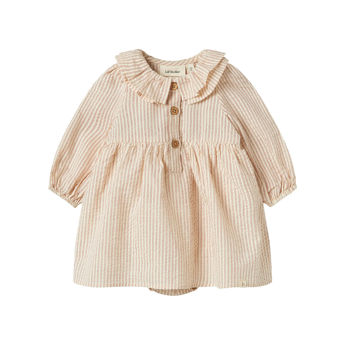 De Lil' Atelier baby Lucia romperjurk in de kleur turtledove is het perfecte kledingstuk voor je kleintje. Deze schattige romperjurk combineert de stijl van een jurk met het gemak van een romper, waardoor het zowel praktisch als trendy is. VanZus