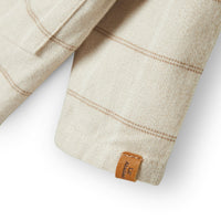 Hoe tof is dit baby nadim rompertje shirt in de variant pure cashmere van het merk Lil' Atelier?! Dit nette rompershirt is perfect voor feestelijke gelegenheden. Het rompertje is gemaakt van 100% biologisch katoen. VanZus