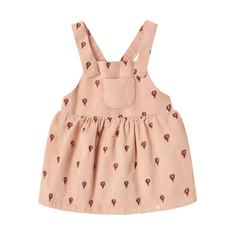 Voeg dit schattige baby nelly corduroy jurkje van Lil' Atelier toe aan de garderobe van je kleintje. Gemaakt van een zacht, geribd katoen, is deze jurk de perfecte mix tussen comfort en stijl. VanZus