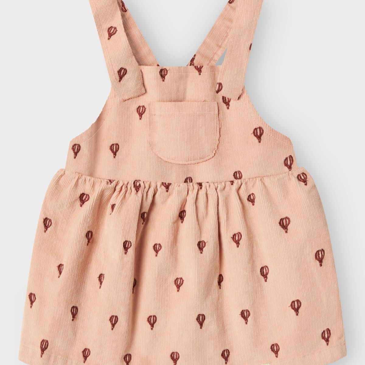 Voeg dit schattige baby nelly corduroy jurkje van Lil' Atelier toe aan de garderobe van je kleintje. Gemaakt van een zacht, geribd katoen, is deze jurk de perfecte mix tussen comfort en stijl. VanZus