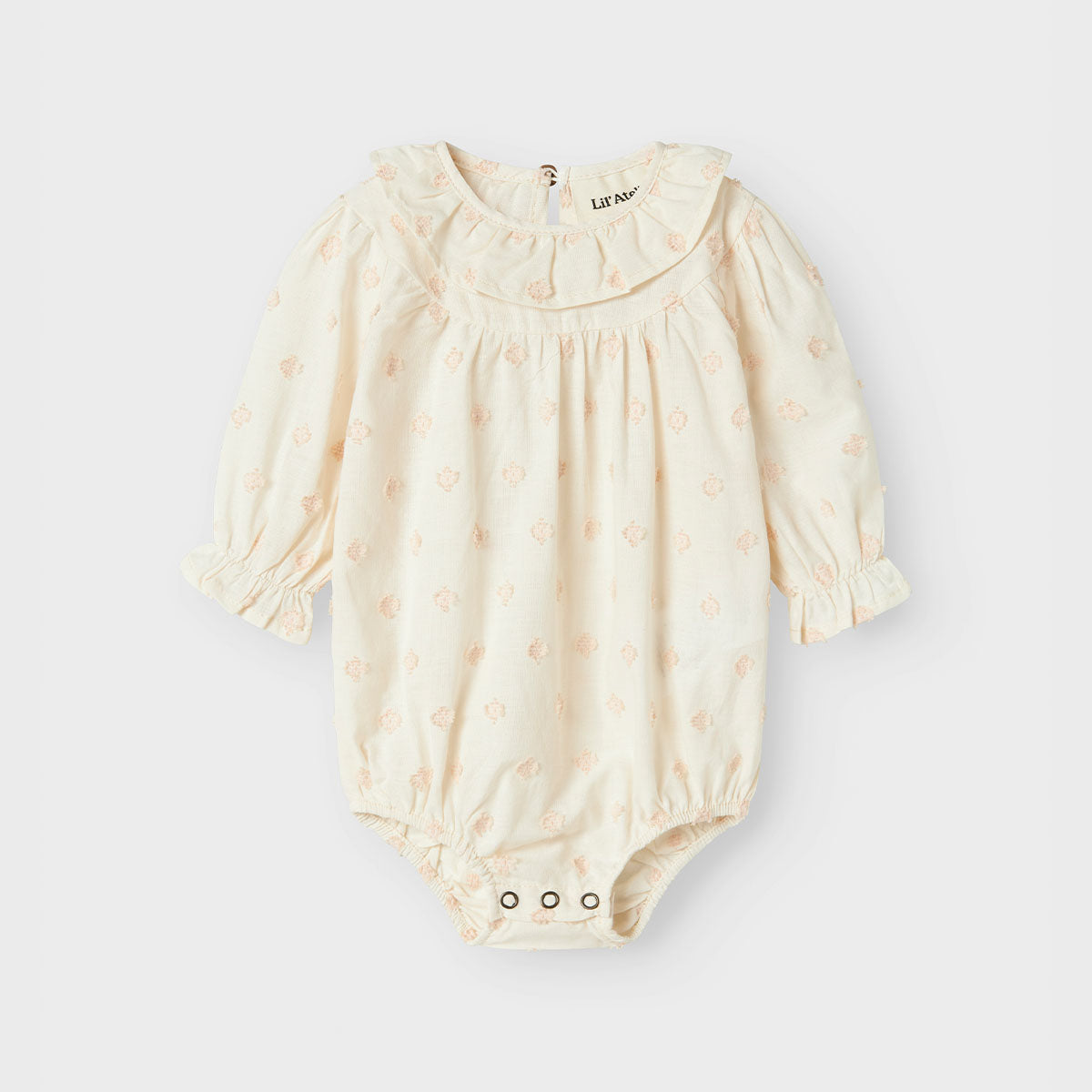 Ontdek het schattige baby nethe rompertje in de kleur pastel parchment van het merk Lil' Atelier. Dit leuke rompertje is een perfecte mix van stijl en comfort. VanZus