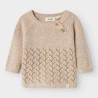 Het baby olga knit shirt in de kleur pastel parchment van het merk Lil' Atelier is een must-have voor elke kindergarderobe. VanZus