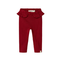 Ben je op zoek naar een schattige legging om de beentjes van je kleintje lekker warm te houden? Dan is deze schattige baby rachel slim legging in de kleur red dahlia van het merk Lil' Atelier een echte must have voor in de collectie. VanZus