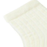 De baby rakel sokken turtledove melange van Lil' Atelier  zijn gemaakt van zachte wolmix met  thermoregulerende eigenschappen voor comfort, ongeacht het seizoen. Perfect voor pasgeborenen. VanZus