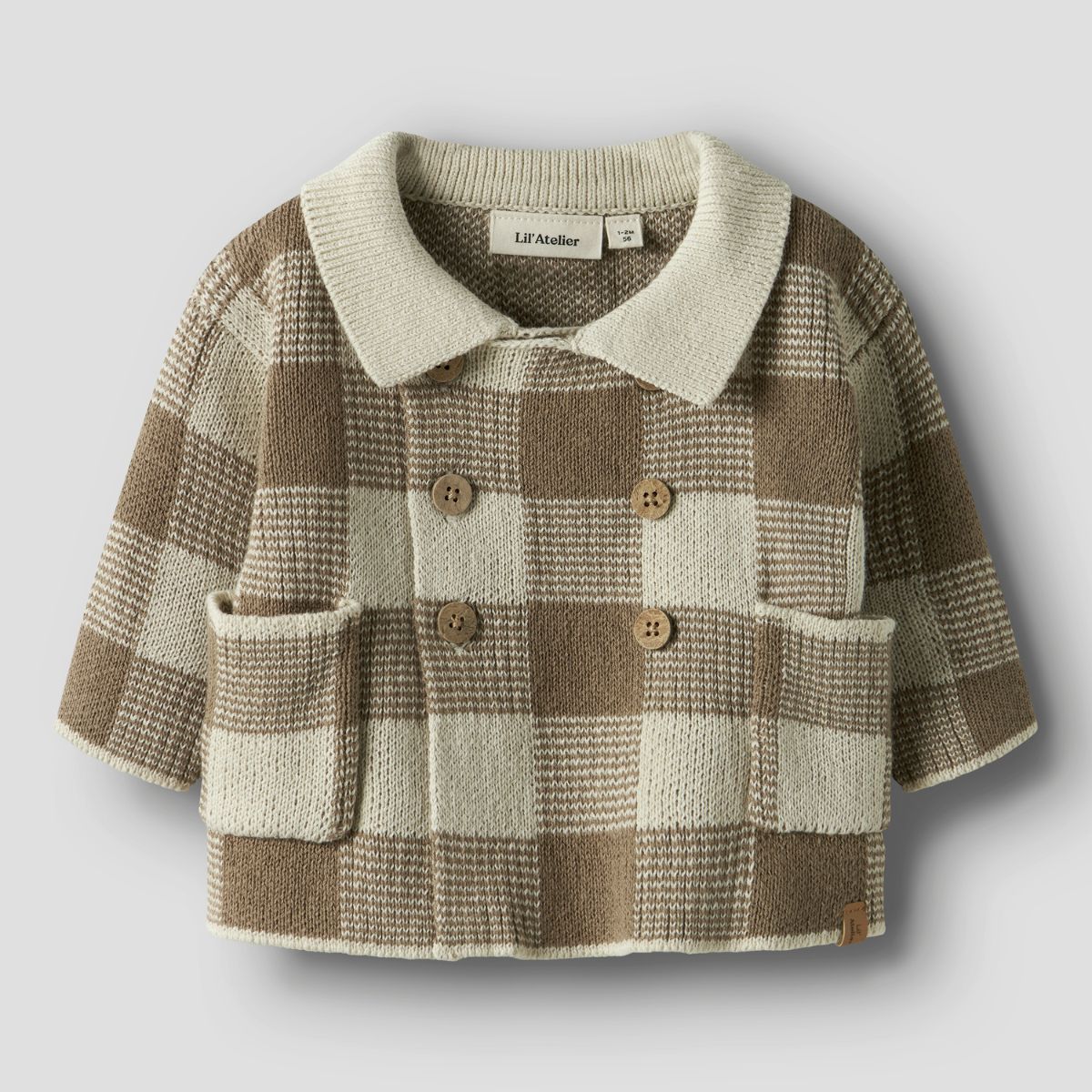 Het robo gebreid vestje sepia tint van Lil' Atelier Baby is een warm, comfortabel vestje voor jouw kleintje. Perfect voor koude dagen. Bestel nu bij VanZus
