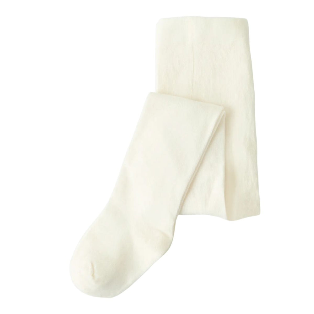 Lil' Atelier funa maillot in coconut milk: gemaakt van biologisch katoen en ribtricot stof. Zacht en elastisch voor een comfortabele, tijdloze look. Perfect voor feestelijke gelegenheden en duurzame keuzes. VanZus