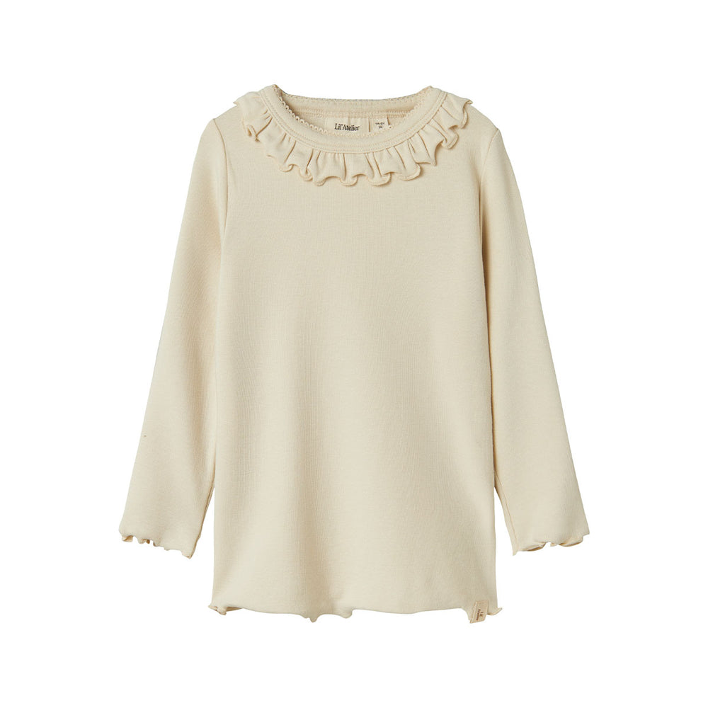 Het Lil' Atelier gayo koj slim shirt in de kleur turtledove is een stijlvolle top die perfect is voor het creëren van een trendy outfit voor je kind. VanZus