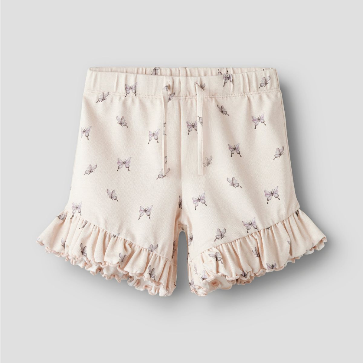 Hip en comfortabel: de gayo shorts in peach blush butterfly van het merk Lil' Atelier. Een luchtige, zomerse short met een loose fit in een lieve kleur roze. VanZus