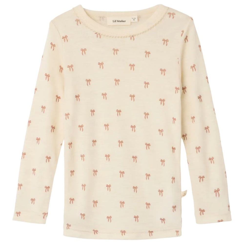 Shop het Lil' Atelier nalu girl slim shirt in de kleur turtledove melange. Dit comfortabele shirt van merinowol en tencel™ is perfect voor elke gelegenheid. Ideaal voor herfst en winter! VanZus