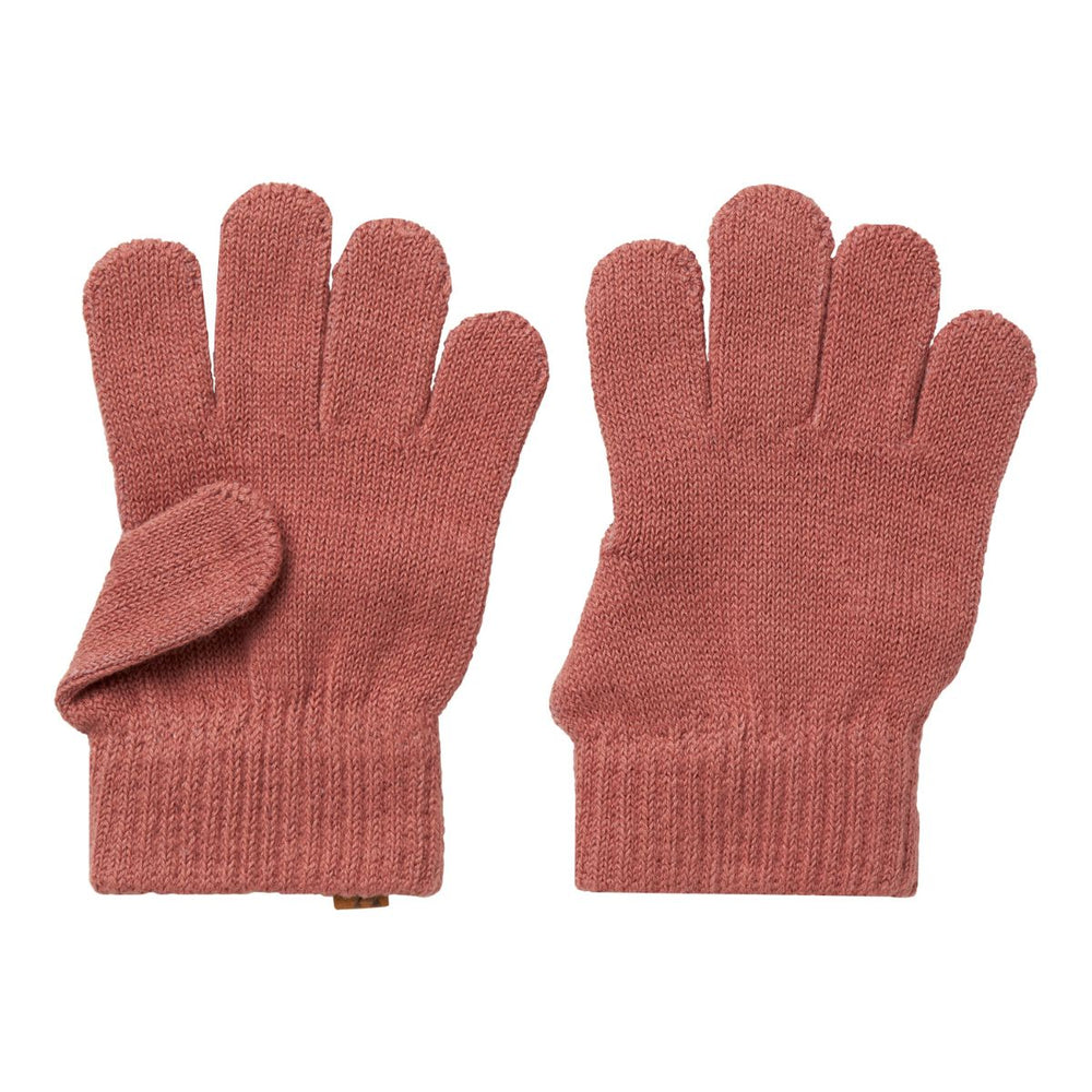 De Lil' Atelier nalu knit handschoenen in de kleur withered rose zijn de perfecte finishing touch voor de winteroutfit van je kleintje. De handschoentjes zijn gemaakt van een zachte gebreide stof en houden de handen lekker warm tijdens de koude dagen. VanZus