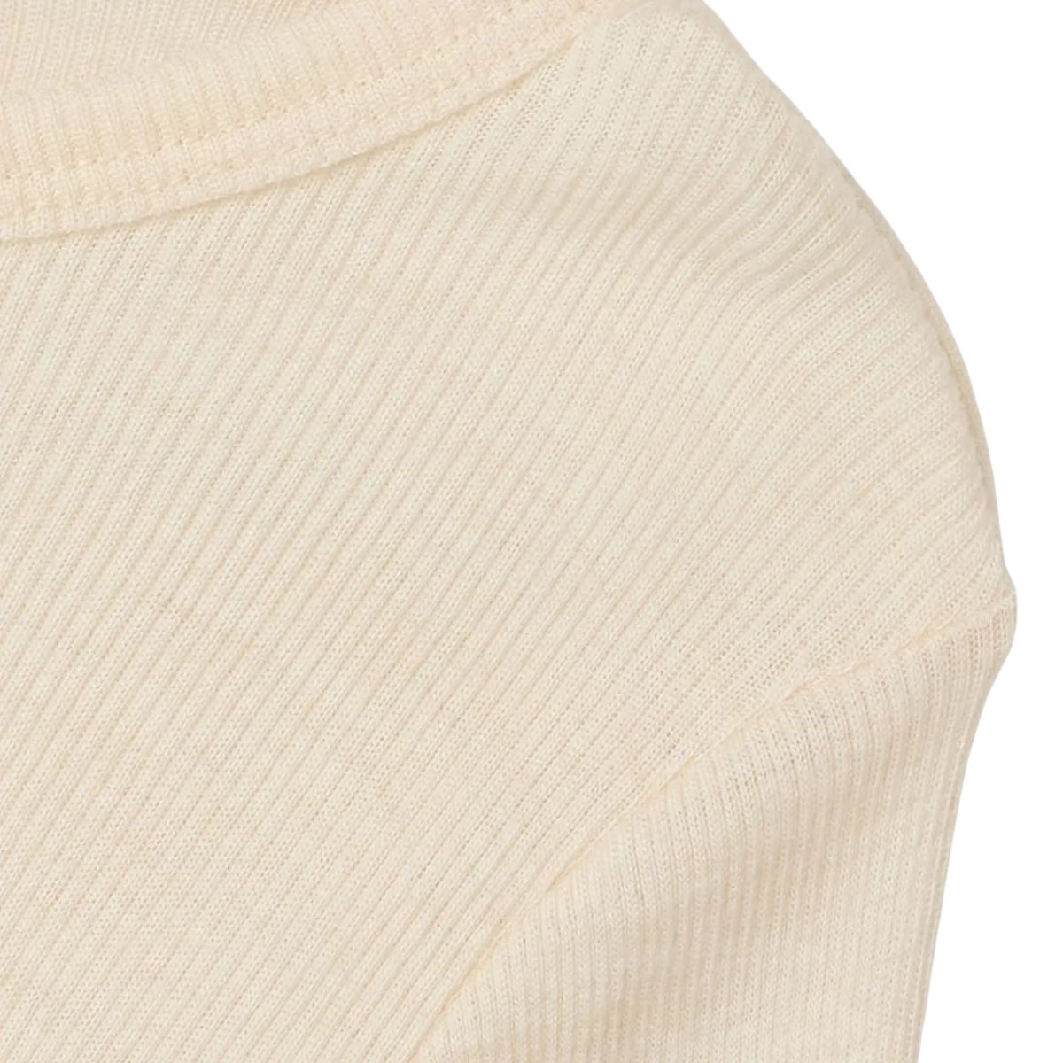 Het Lil' Atelier nalu slim boy shirt in turtledove melange is unisex, gemaakt van zachte merinowol en TENCEL™, biedt comfort en stijl voor je kind tijdens de herfst en  winter. VanZus