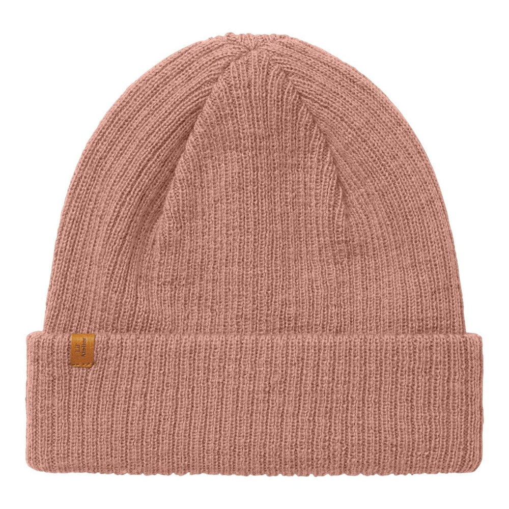 De Lil' Atelier nanson knit muts in de kleur misty rose is de perfecte finishing touch voor de winteroutfit van je kleintje. De muts is gemaakt van een zachte gebreide stof, namelijk 100% wol, en houdt het hoofdje lekker warm tijdens de koude dagen. VanZus