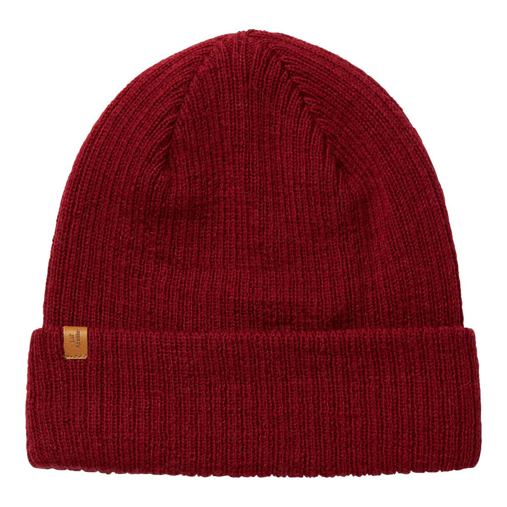 De Lil' Atelier nanson knit muts in de kleur red dahlia is de perfecte finishing touch voor de winteroutfit van je kleintje. De muts is gemaakt van een zachte gebreide stof, namelijk 100% wol, en houdt het hoofdje lekker warm tijdens de koude dagen. VanZus