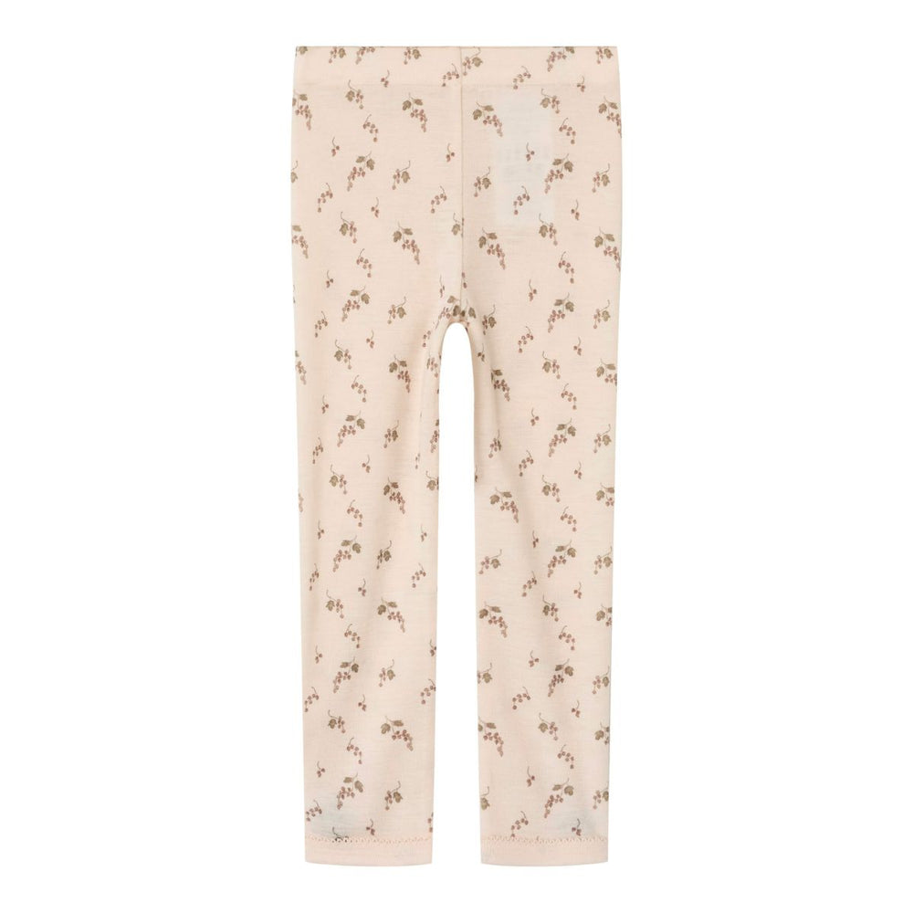 De noel wol slim legging in de kleur morganite berry van met merk  Lil' Atelier is gemaakt van 100% merinowol en biedt comfort en stijl voor je kind in de herfst en winter! VanZus