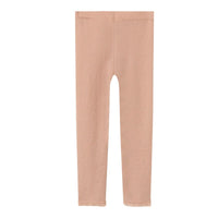 Kies voor de Lil' Atelier noel wol slim legging in de variant roebuck. Deze vrouwelijke en modieuse legging van 100% merinowol biedt warmte en stijl voor je kind in de herfst en winter! VanZus