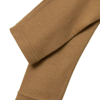 Kies voor de Lil' Atelier noel wol slim legging in de variant tigers eye. Deze vrouwelijke legging van 100% merinowol biedt warmte en stijl voor je kind in de herfst en winter! VanZus