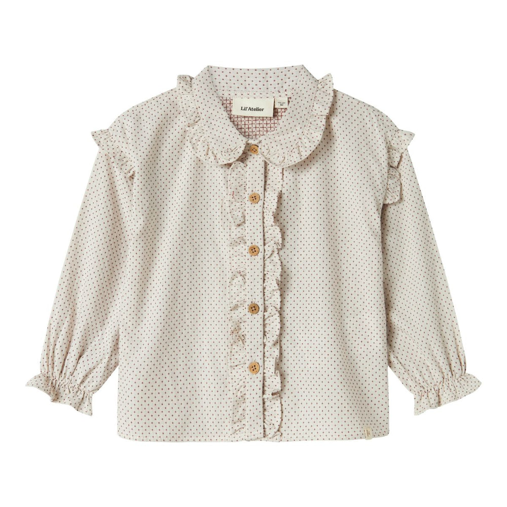 Maak je kleintje klaar voor feestelijke gelegenheden met dit mooie olena shirt in pastel parchment van het merk Lil' Atelier. Dit blousje zal elk kindje geweldig staan. VanZus