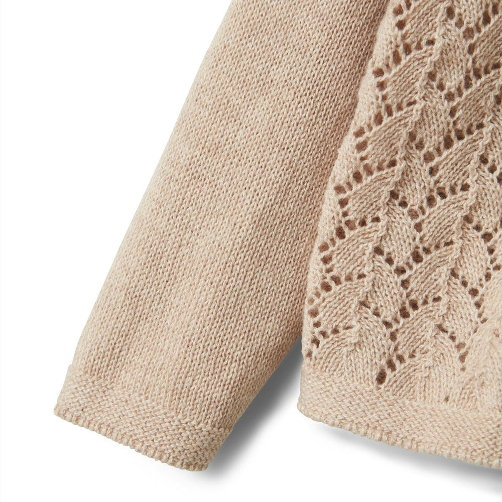 Het Lil' Atelier olga knit vestje in pastel parchment melange is een ideale aanvulling voor de garderobe van je kind. VanZus