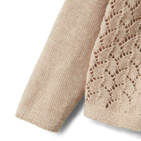 Het Lil' Atelier olga knit vestje in pastel parchment melange is een ideale aanvulling voor de garderobe van je kind. VanZus