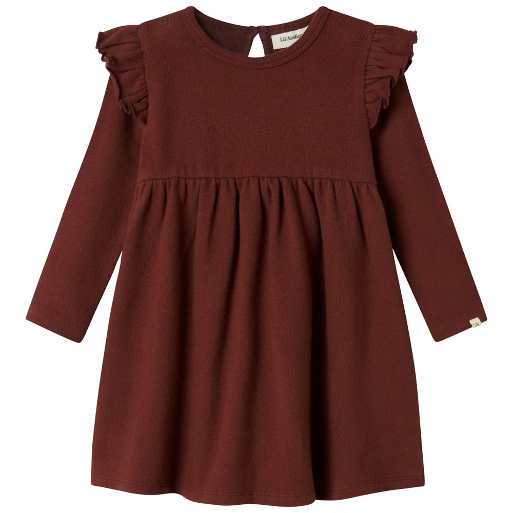 Ben je op zoek naar een mooie basic voor in de kledingkast van je kleintje? Dan is deze thora jurk in de kleur hot chocolate van het mooie merk Lil' Atelier een echte must have! VanZus