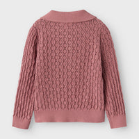 Creëer een comfortabele en trendy look voor jouw kleintje met deze leuke tolina longsleeve knit trui in de kleur nostalgia rose van het merk Lil' Atelier. Deze trui zit niet alleen heel lekker, hij ziet er ook geweldig uit! VanZus