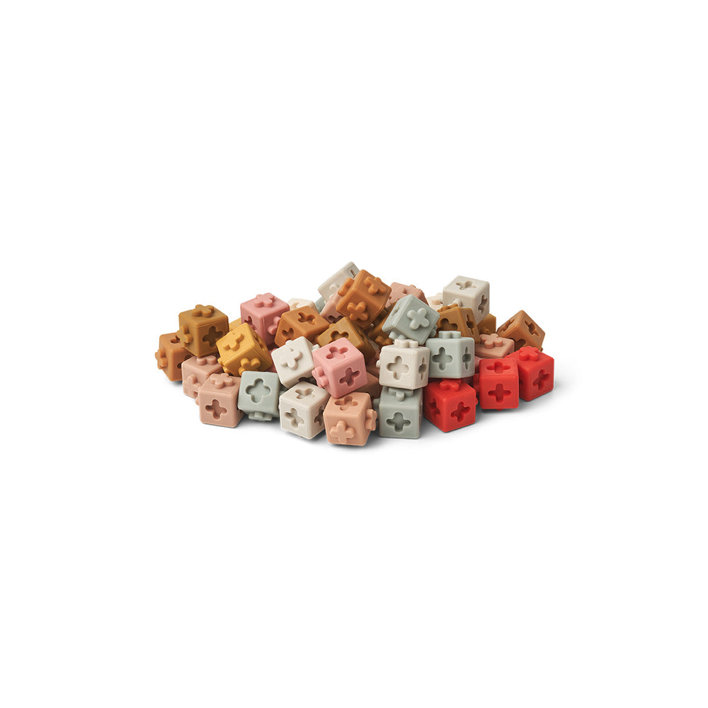 Maak de mooiste kunstwerken, met Liewood’s bouwblokken 50-pack dusty raspberry multi mix! De set bestaat uit blokken van 2x2x2 cm in tien verschillende kleuren. 100% siliconen dus zacht om vast te pakken. VanZus