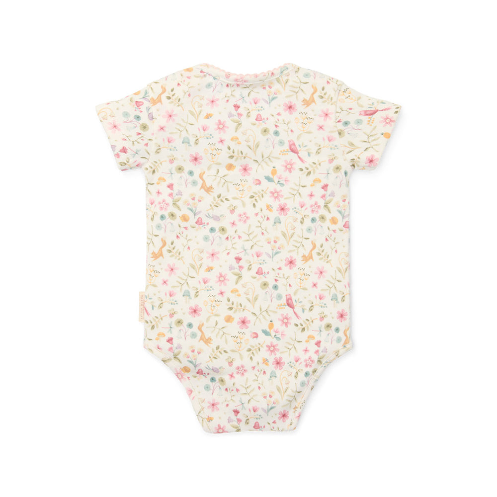 Deze romper met korte mouw in de variant fairy garden van Little Dutch is een heerlijke basic die je uitstekend kunt combineren met de andere items van Little Dutch! Dit witte rompertje voor jouw kleintje is namelijk superveelzijdig. VanZus
