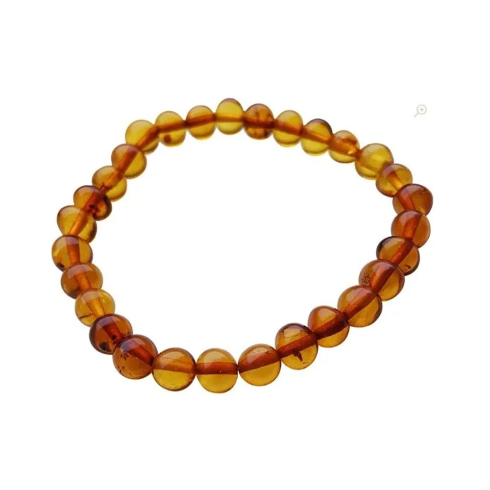 Een prachtig sieraad met positief effect: de balance amber mommy armband van Mahina La. Gemaakt van gepolijst amber barnstenen met een holistische verlichting van pijn en kalmerende werking. Hip en positief. VanZus