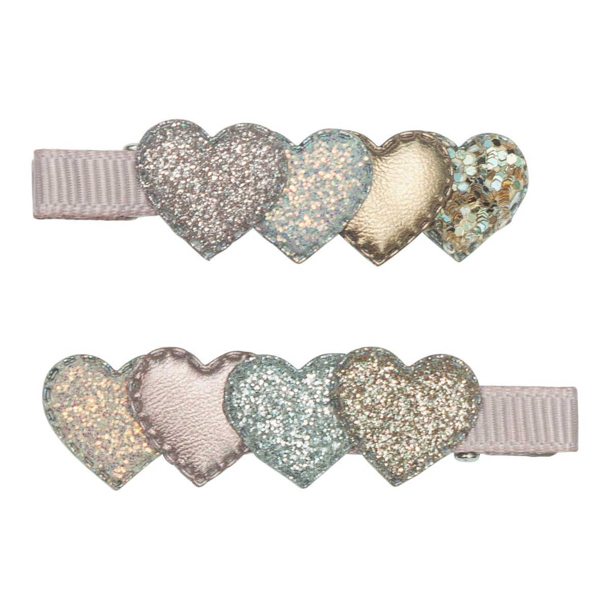 Laat je meisje stralen met de stijlvolle layered heart Haarspeldjes van Mimi & Lula. Deze haaraccessoires met 3D-hartjes voegen een speelse, romantische touch toe aan elke look. Perfect voor school of feestjes. VanZus