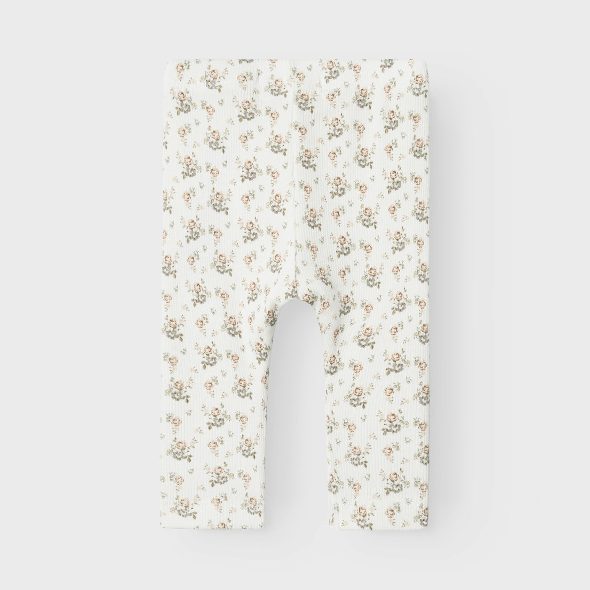 Ben je op zoek naar een schattige legging om de beentjes van je kleintje lekker warm te houden? Dan is deze schattige legging in de variant milk flower van het merk Lil' Atelier een echte must have voor in de collectie. VanZus